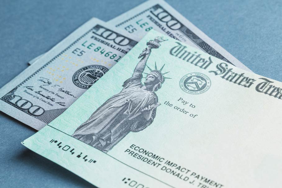 A US stimulus check with some one-hundred-dollar bills